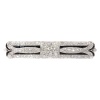 Art Deco Allure: Platinum Brooch with Contrasting Diamonds and Onyx